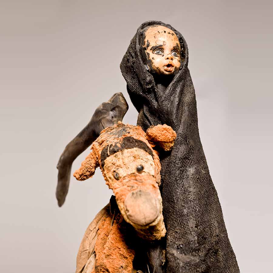 <strong>Gérard Quenum</strong>, <em>La Vendangeuse</em>, 2012.
Wood, metal, cloth and plastic doll, 203 x 63  x 30 cm.