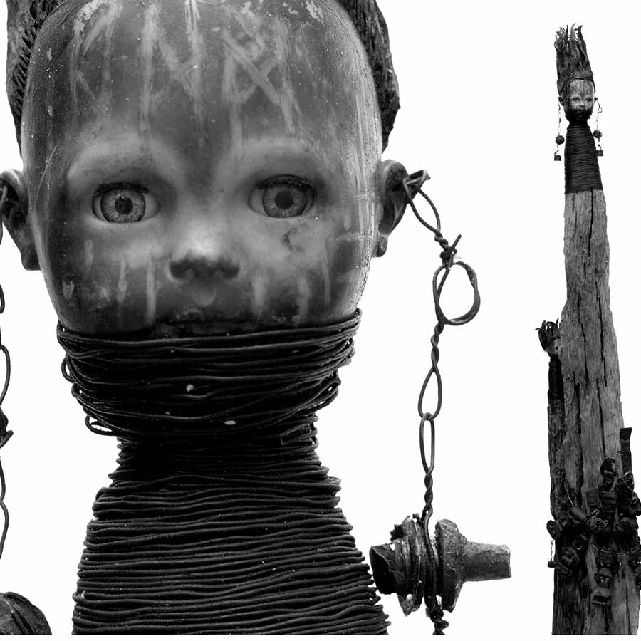 <strong>Gérard Quenum</strong>, <em>Femmes Peul</em>, 2007. Wood, doll, wire, hardware, 203 x 37 x 16 cm.